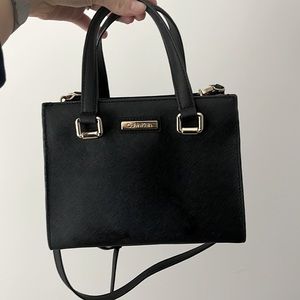 Brand New Calvin Klein bag. Used one or two times maybe.